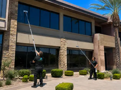 Streak-free commercial window washing on a storefront